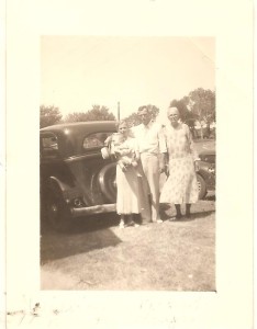 Nana, holding my father, with her father, and his mother (c. 1936)